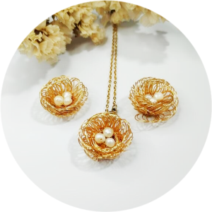 Set en Alambrimo en material Acero y Perla Natural de Rio