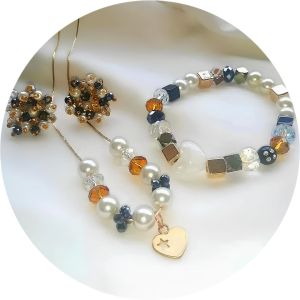 Set Completo tejido a mano en material oro golfi cristal y perla